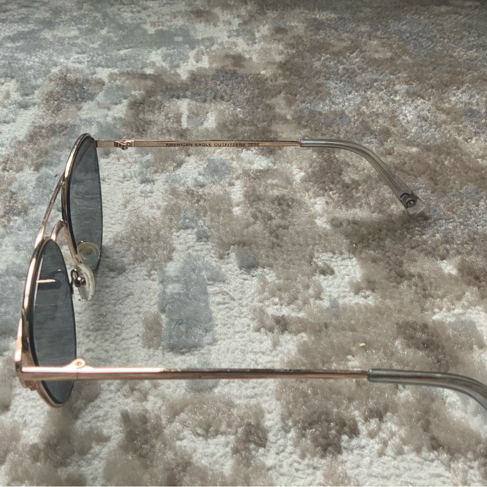 Gold frame sunglasses